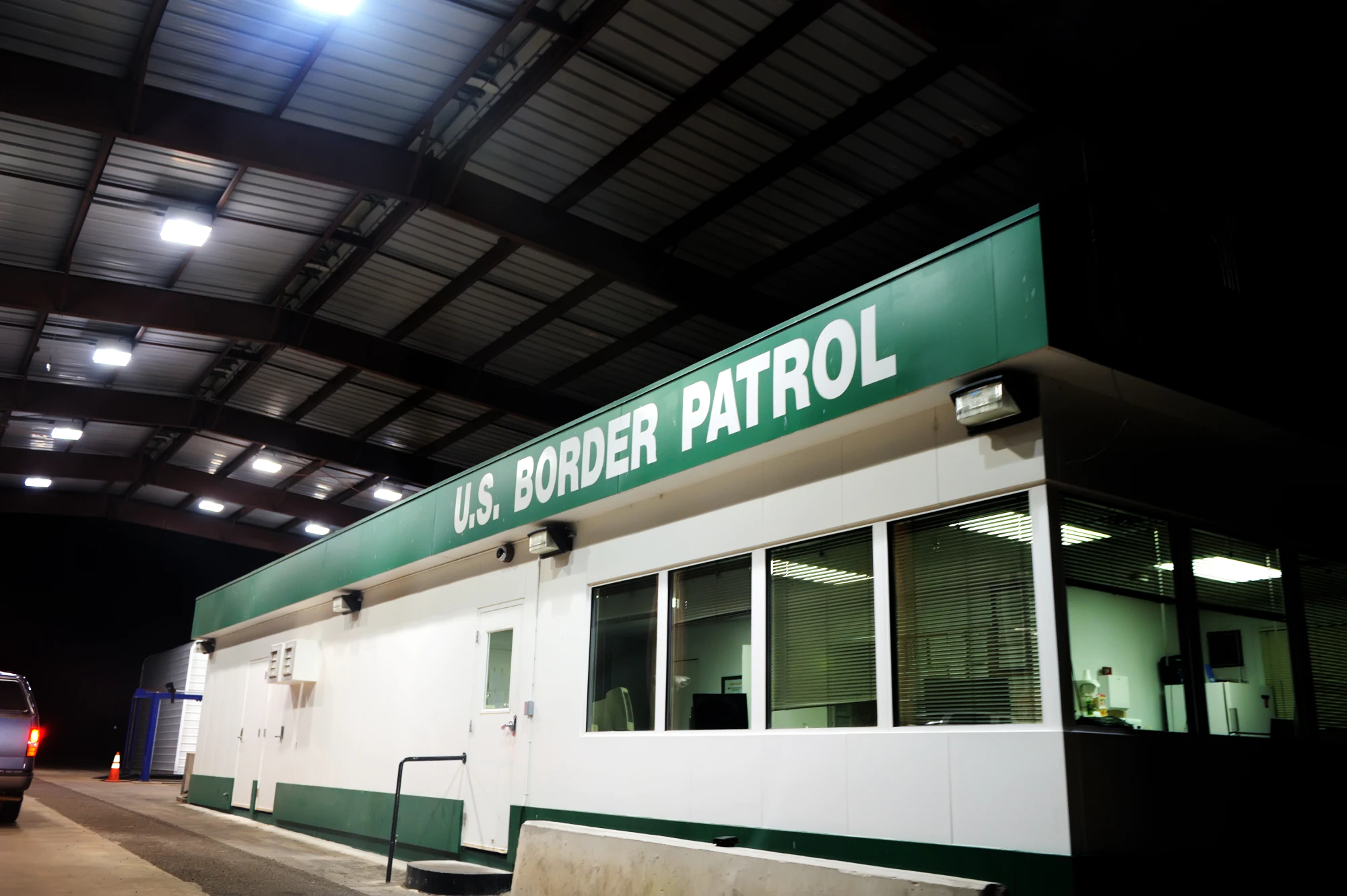 US Border Patrol booth at night