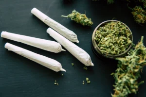 Marijuana joints on a table.