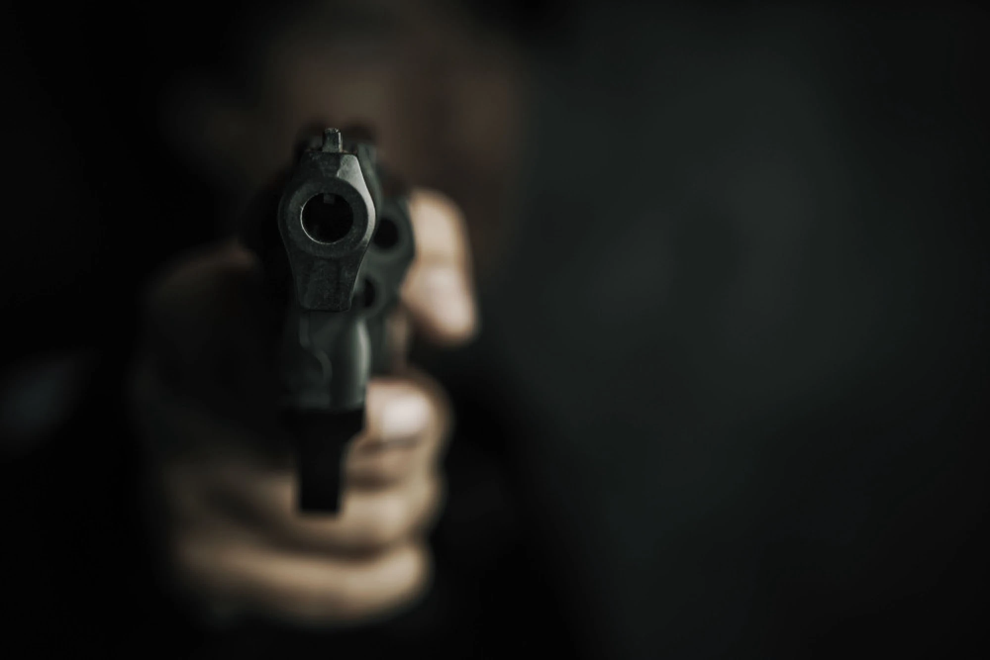 Man pointing a gun