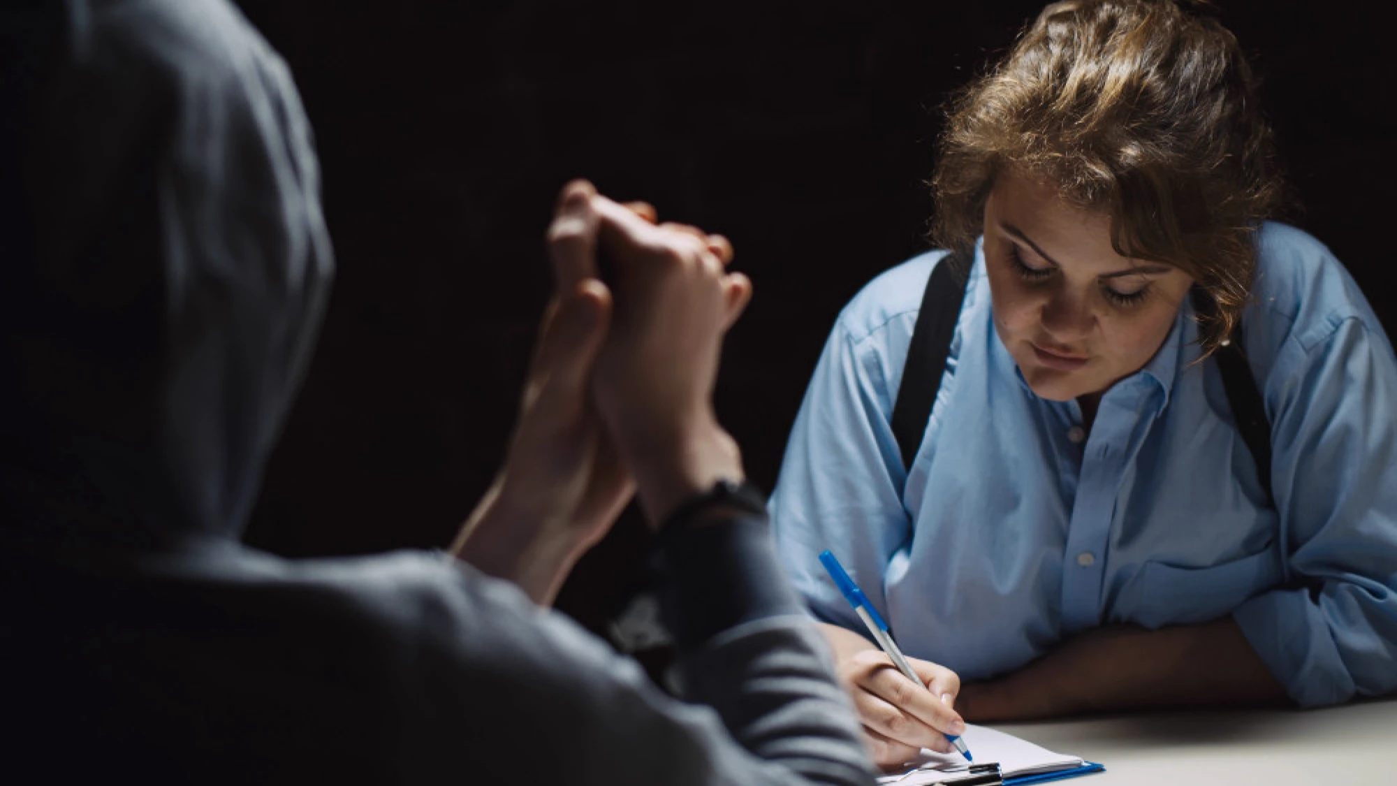 A confidential informant providing a statement to a police officer