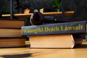 A stack of legal books labeled “wrongful death lawsuit”