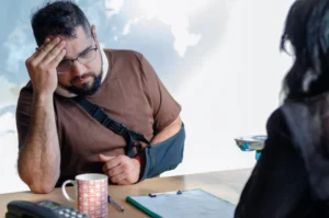 A critically injured man meeting with an attorney