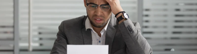 A well-dressed man who has received a federal target letter