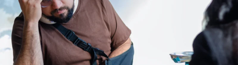 A critically injured man meeting with an attorney