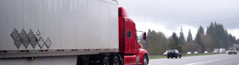 Big rig semi truck driving on the highway